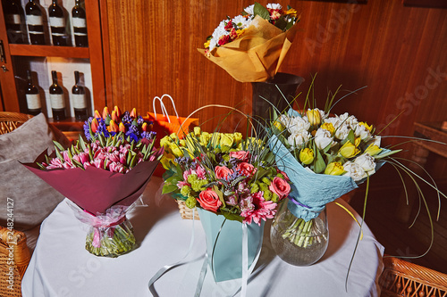 Wine cellar restaurant celebration of birthday flowers presents photo