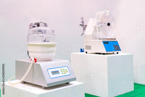 automatic vacuum leak tester device or equipment of lab for test quality of packing process check sachets containing tablets granulates & liquids & in strips blisters in industries food pharmaceutical photo