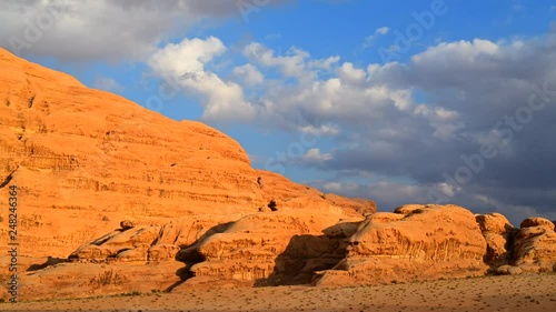 Time lapse Movie Sunset Scene of Wadi rum Desert in Jordan, It is also known as the Valley of the Moon, Many Movie Shot in Wadi Rum photo