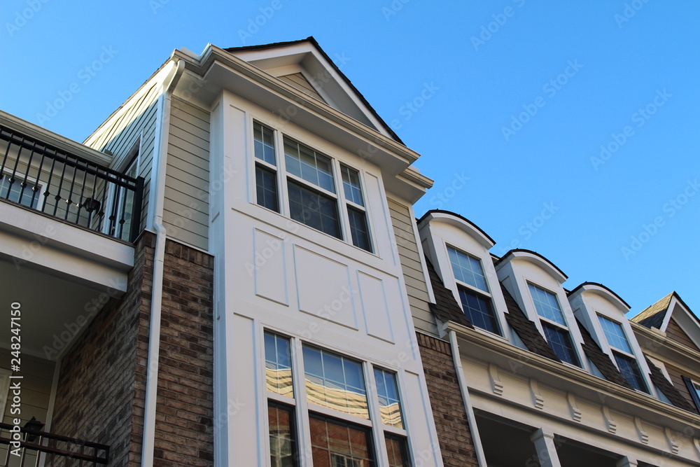 Modern townhouse facades in the sunny day, low camera angle view. Virginia, USA