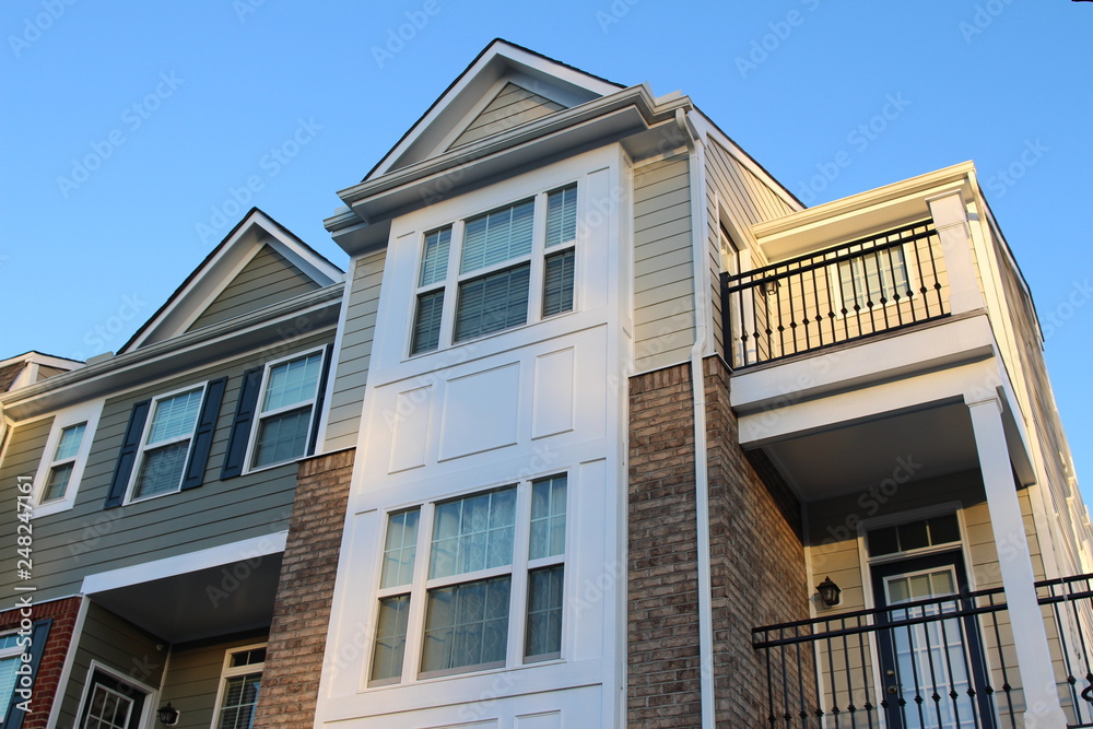 Modern townhouse facades in the sunny day, low camera angle view. Virginia, USA