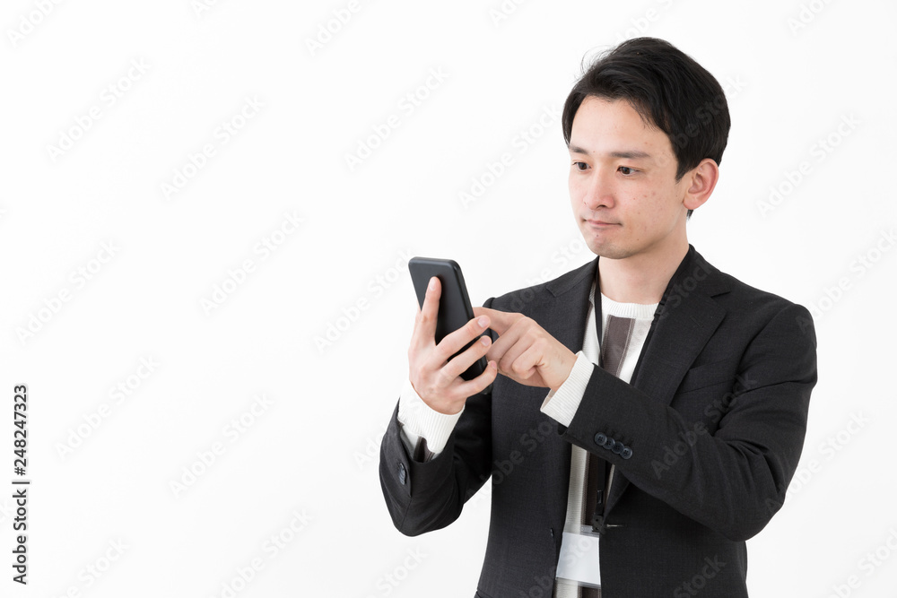 portrait of young asian man wearing suit isolated on white background portrait of young asian man wearing suit isolated on white background