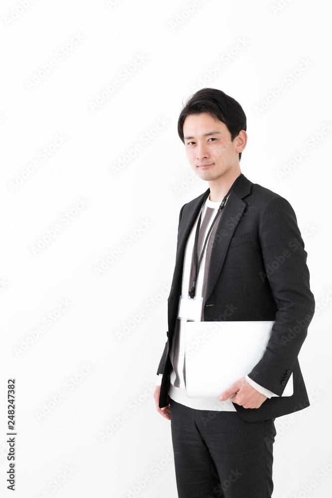 portrait of young asian man wearing suit isolated on white background portrait of young asian man wearing suit isolated on white background