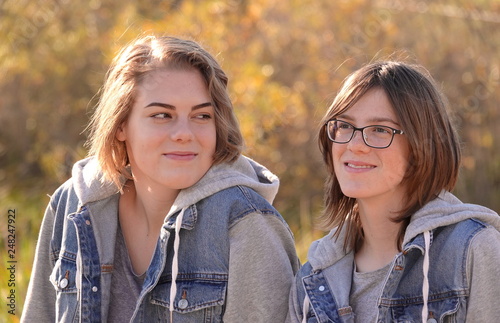 Casual outdoor portrait of two sisters 