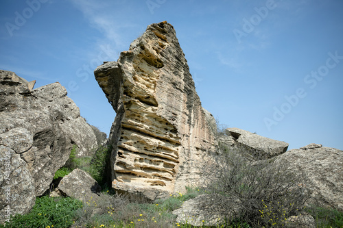 Gobustan,Azerbaijan.A national treasure,a landmark,a rocky area with a rich and ancient history.district of Azerbaijan.On the rocks are drawn pictures of people who lived here in ancient times. © melnikviva