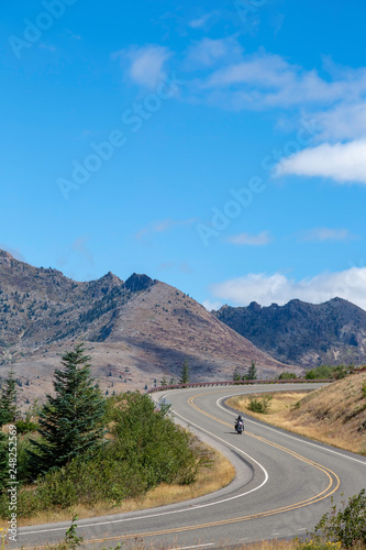 Cycle rider on a mountain road
