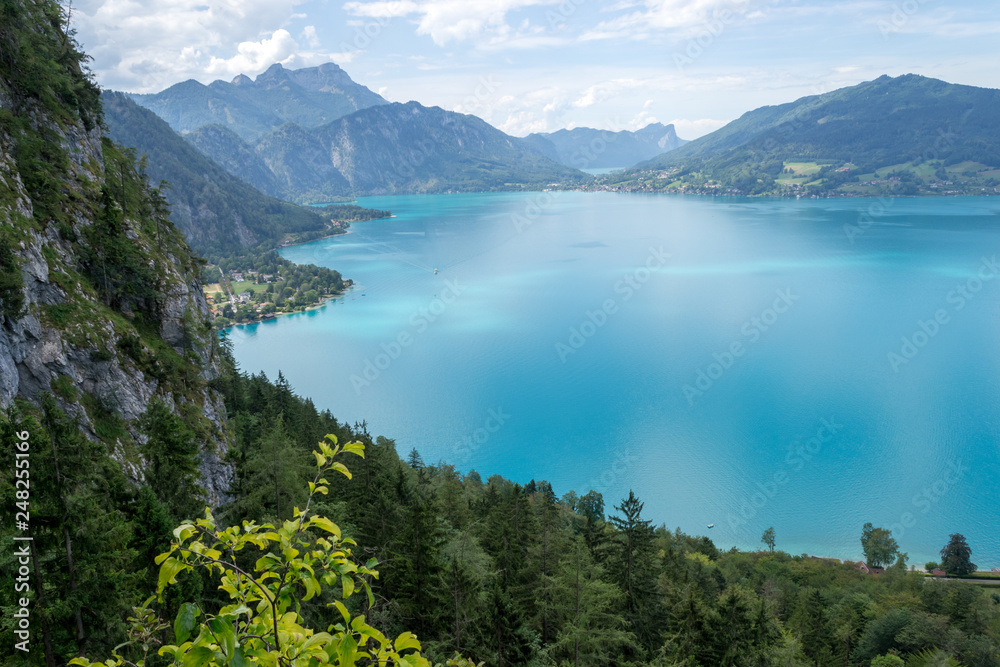 Top view of Attersee lake, Austria, as seen from the via ferrata route above it, on a clear, hot, Summer day.