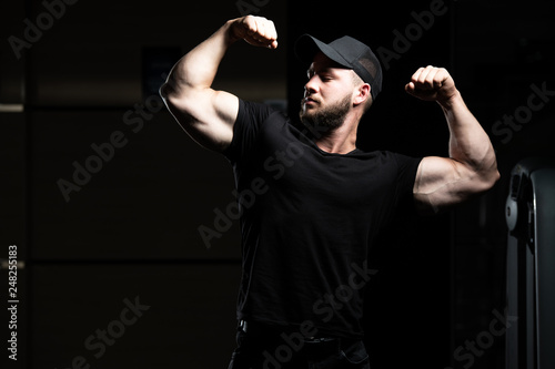 Muscular Men Is Hitting Double Bicep Pose