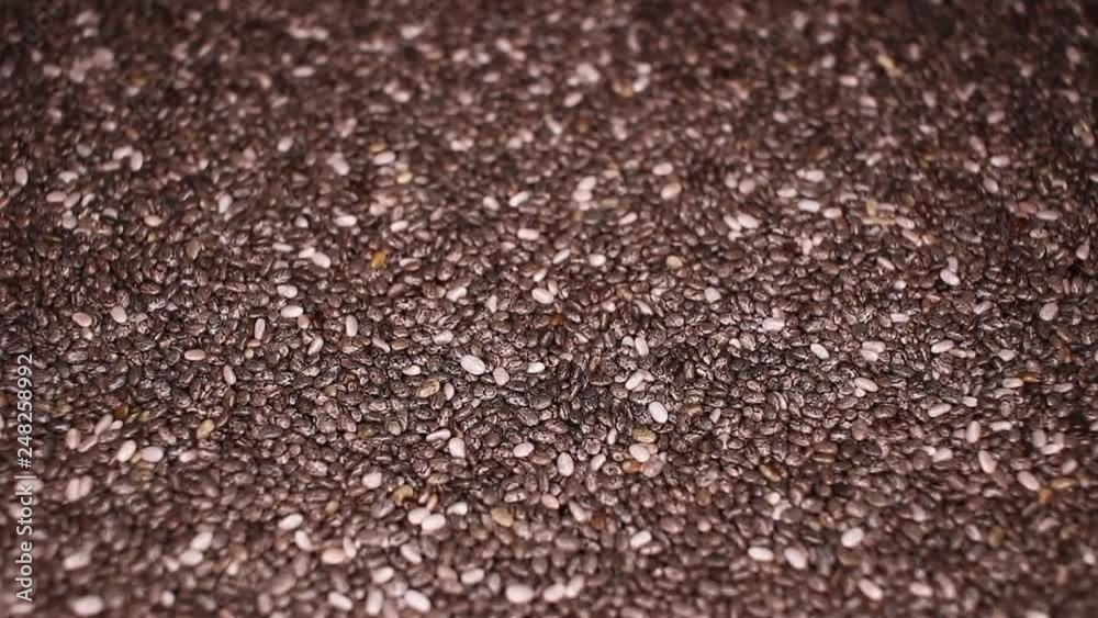 Chia seeds seed food closeup texture pattern. Seamless looping video footage Chia seeds seed food closeup texture pattern. Seamless looping video footage