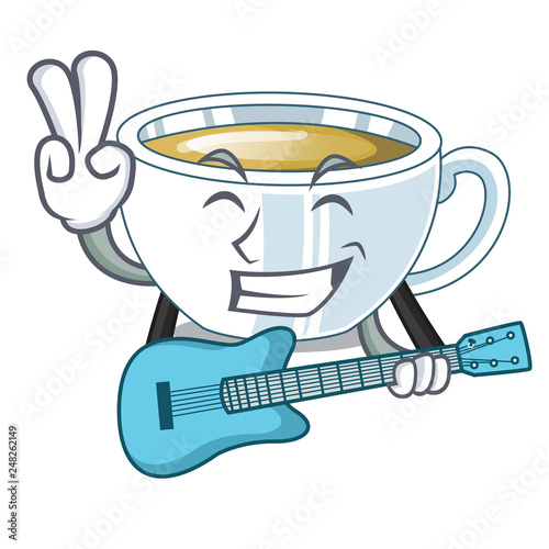 With guitar ginger tea in the cartoon shape photo