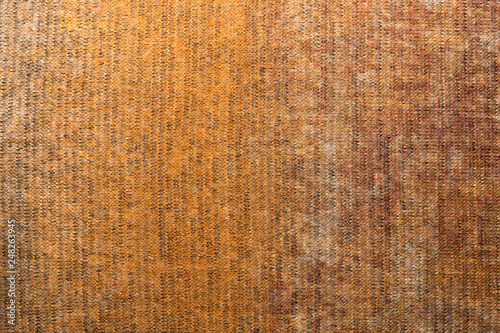 Abstract knitted fabric for backgrounds.Knitted texture.Grunge style