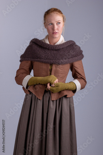 18th century woman in brown ensemble