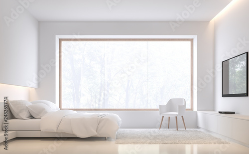 Minimal style bedroom with nature 3d render There are white floor and wall.Furnished with white bed set.There are large wood frame window overlooks to outside.
