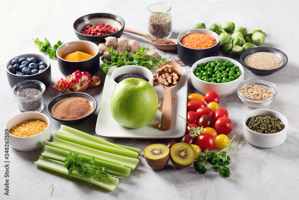 Vegetables, fruit, grain, superfoods for vegan and vegetarian eating. Vegetables, fruit, grain, superfoods for vegan and vegetarian eating.