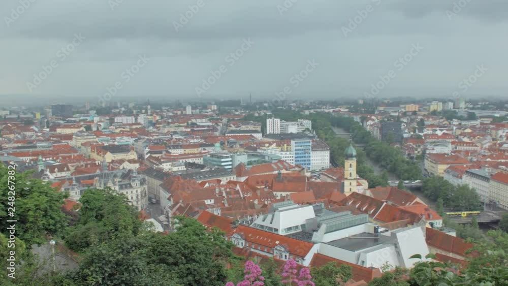 rain is in austrian Graz city in spring time, top view from Schlossberg hill rain is in austrian Graz city in spring time, top view from Schlossberg hill