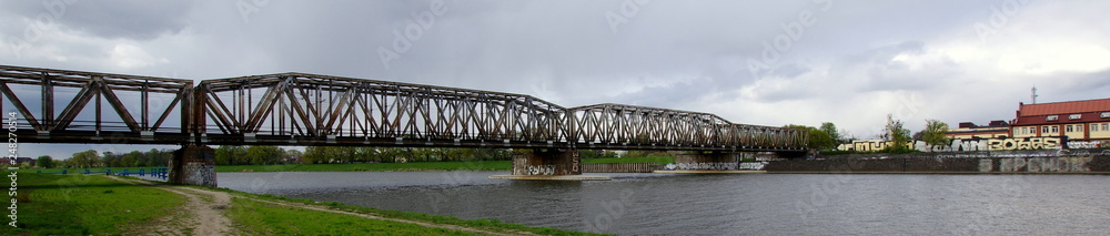 Fototapeta premium A railway viaduct in Wroclaw leading across the Odra River