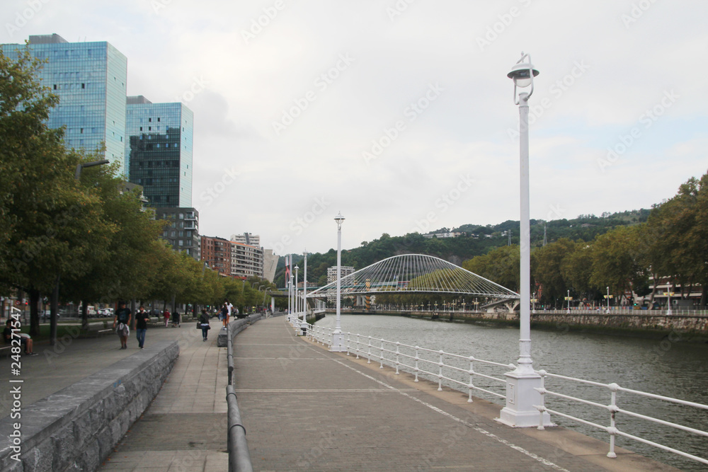 The Zubizuri bridge and embankment in Bilbao