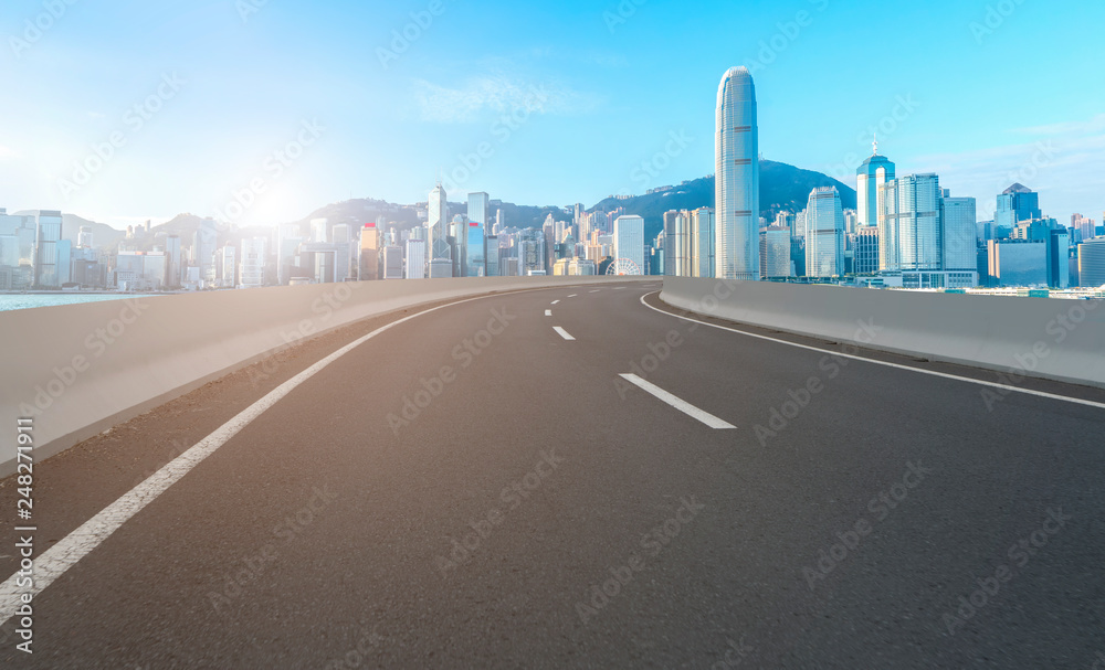 Road and skyline of modern urban architecture in Hong Kong.. Road and skyline of modern urban architecture in Hong Kong..