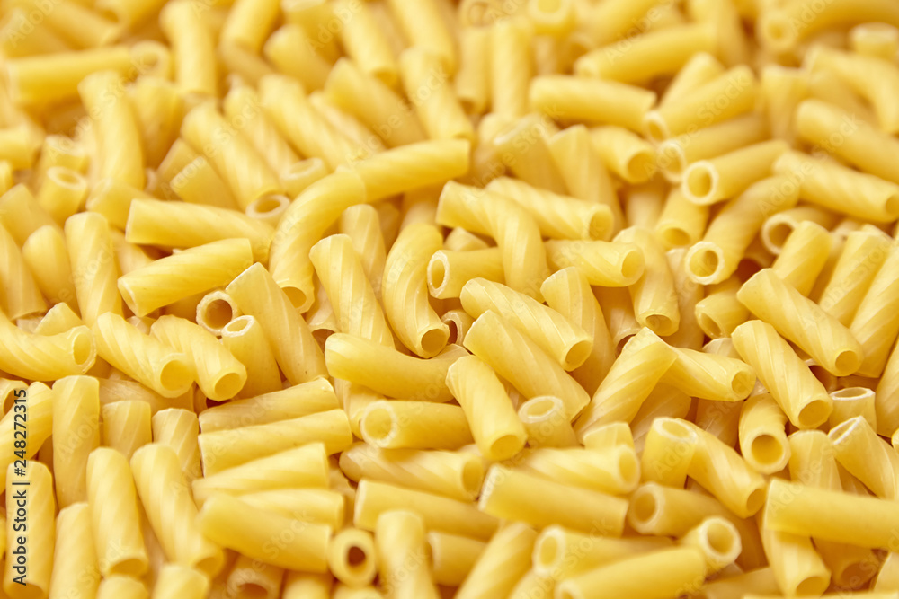 Tortiglioni italian pasta is short pasta with ribbed surface and straight cut, similar to small tubes Tortiglioni italian pasta is short pasta with ribbed surface and straight cut, similar to small tubes