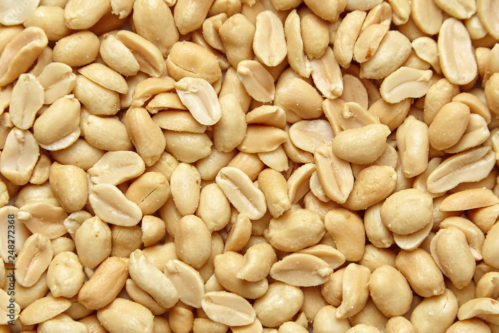 roasted peanuts, salted snack as background, top view roasted peanuts, salted snack as background, top view
