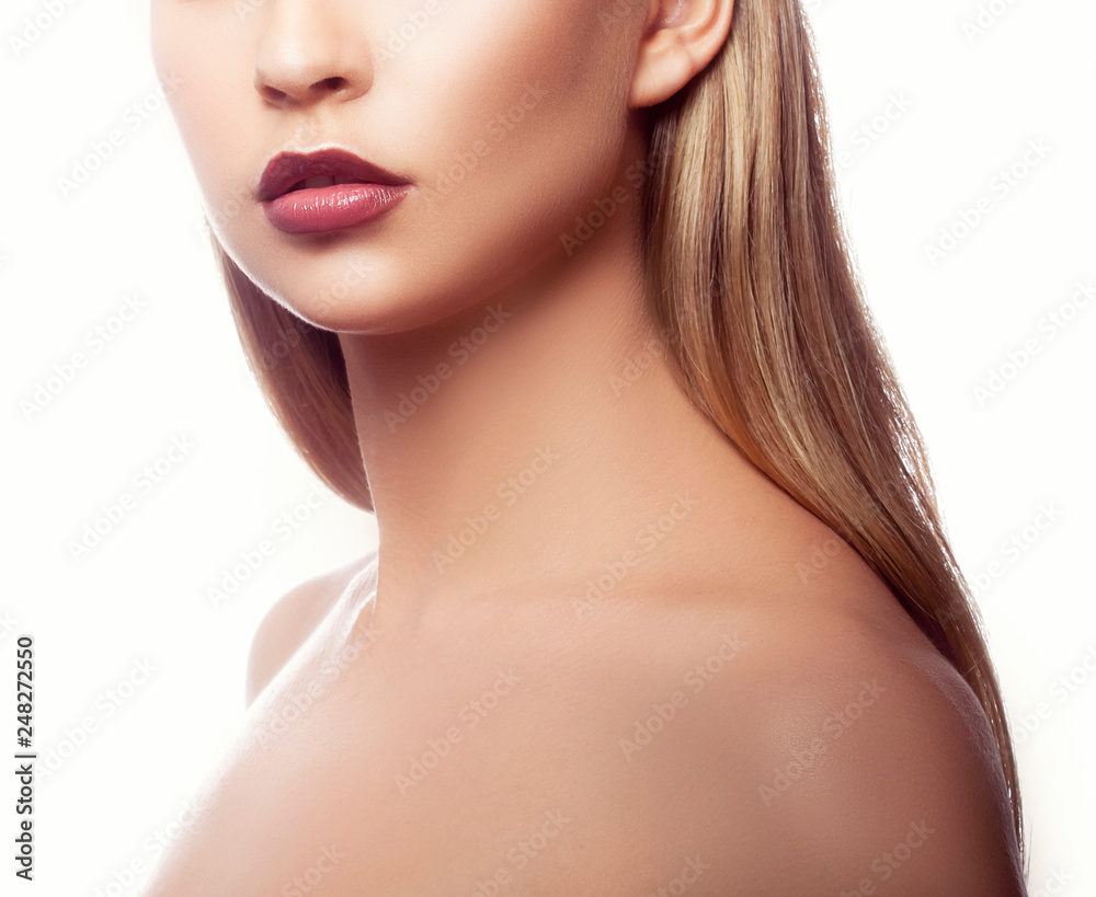 Lips, neck and shoulders of caucasian girl with bright red marsala lips make-up, perfect clean skin. Beauty young woman part of face. Skincare female health concept. White background Lips, neck and shoulders of caucasian girl with bright red marsala lips make-up, perfect clean skin. Beauty young woman part of face. Skincare female health concept. White background