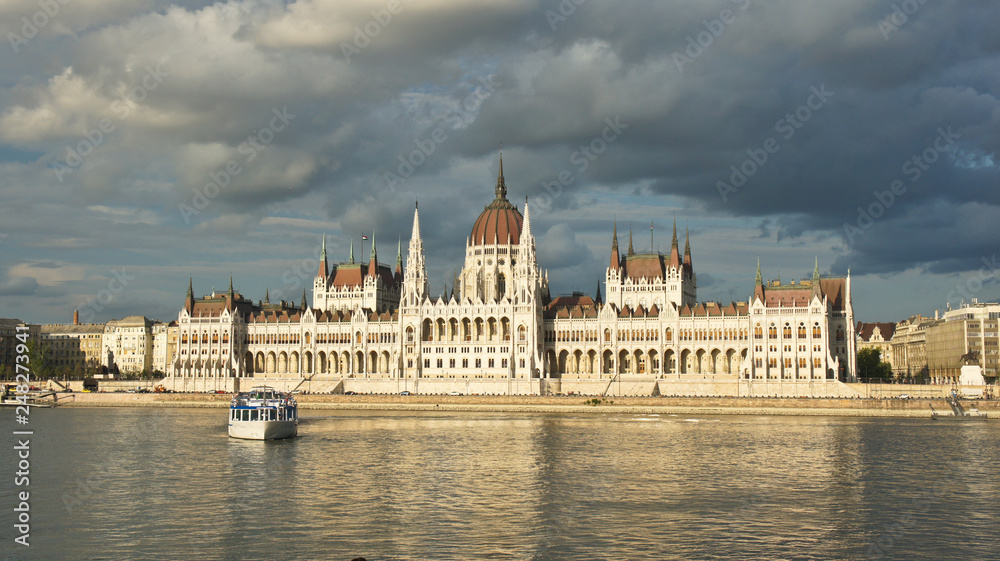 Fototapeta premium Panoramic view of the Hungarian Parliament building on the bank of the Danube in Budapest, Hungary