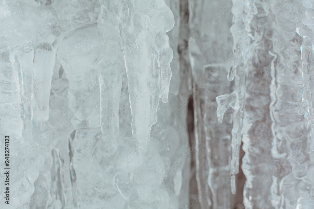 Very large and dangerous icicles close up Very large and dangerous icicles close up