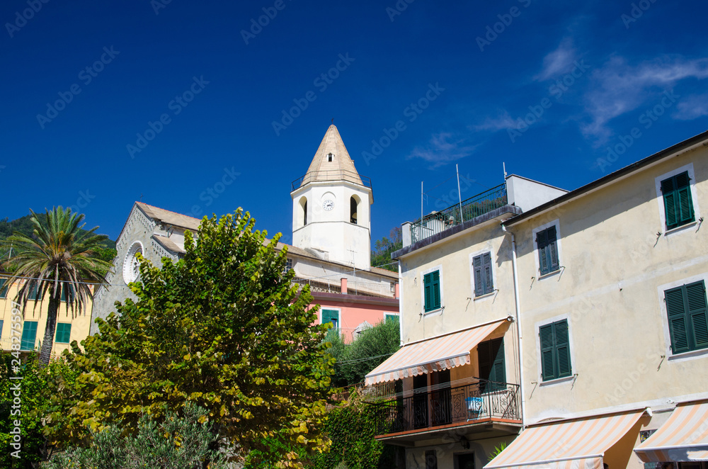 Chiesa Di San Pietro catholic church in Corniglia village with clear blue sky copy space background in beautiful summer day, National park Cinque Terre, La Spezia province, Liguria, Italy
