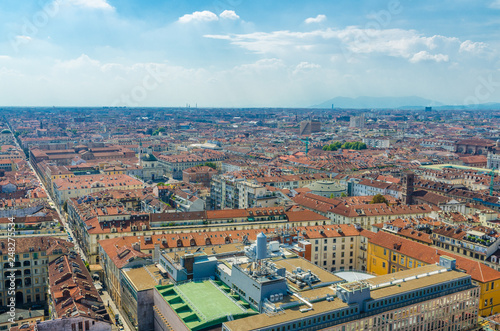 Aerial top panoramic view of Turin Torino city historical centre districts quarters, streets, churches, squares, buildings with orange tiled roofs, sightseeings, Piedmont, Italy