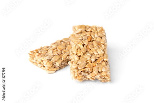 Sunflower seed kozinaki isolated on white background. Sweet bars with seeds and caramel. 