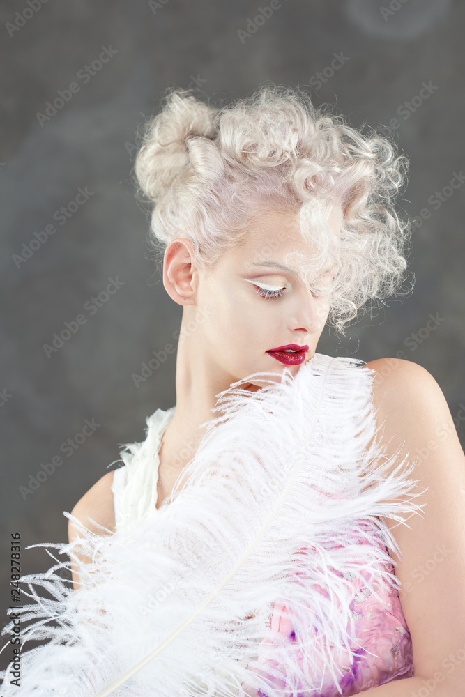 Young attractive woman with platinum blonde and purple lipstick Young attractive woman with platinum blonde and purple lipstick