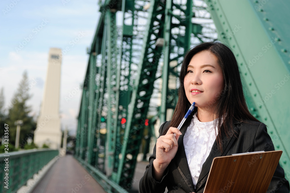 Fototapeta premium Asian business women happy for jobs succes,Asian women happy with her business and investment