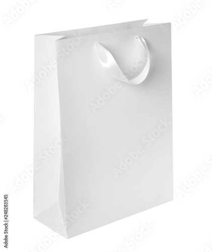 Paper shopping bag isolated on white. Mock up for design