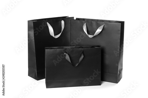 Paper shopping bags isolated on white. Mock up for design