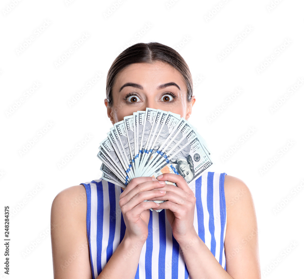 Portrait of young woman holding money banknotes on white background Portrait of young woman holding money banknotes on white background