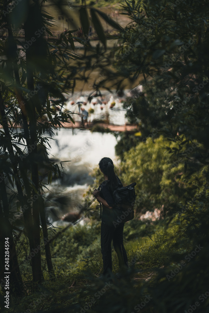 Woman hiker exploring jungle in Sa Pa Vietnam