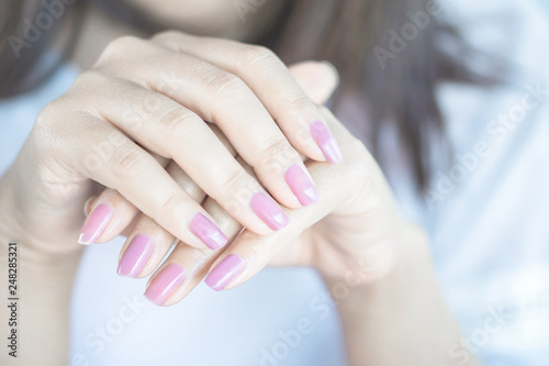 closeup beautiful woman hand with nail polish ,  beauty and spa concept background 