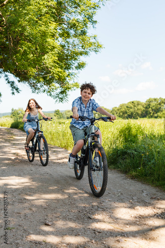 Urban biking - kids riding bikes