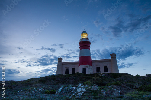 Wide angle image of the iconic lighthouse in cape agulhas at the southern most tip of africa