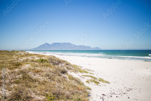 Wide angle view of table mountain from blouberg beach in cape town south africa