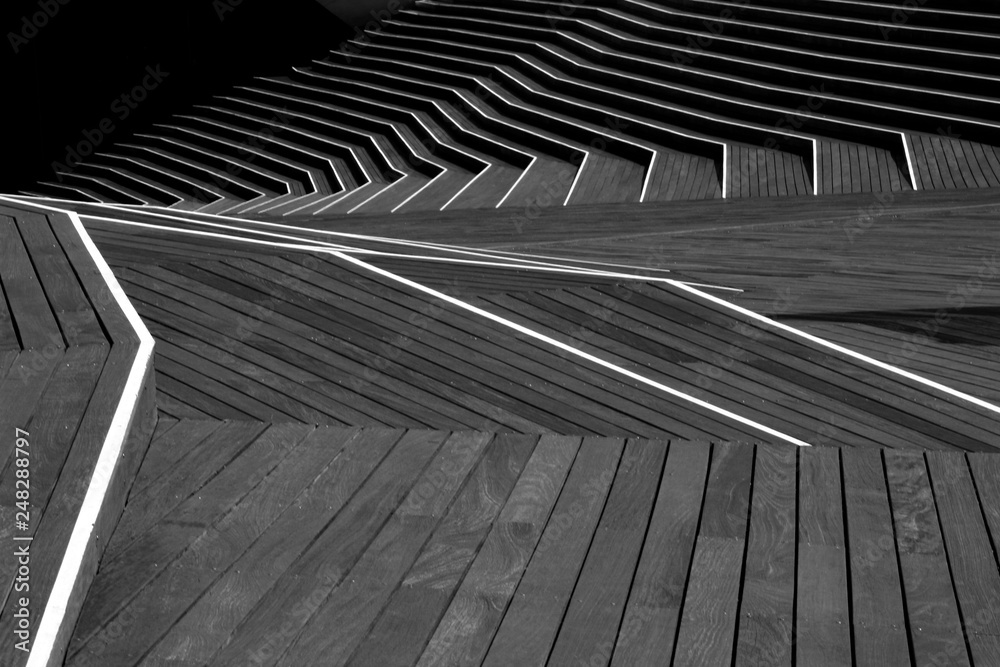 Wooden staircase designed in a complex way Wooden staircase designed in a complex way