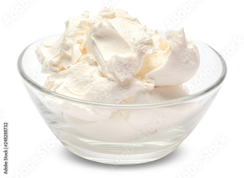 Traditional Mascarpone cheese in glass bowl isolated on white with clipping path