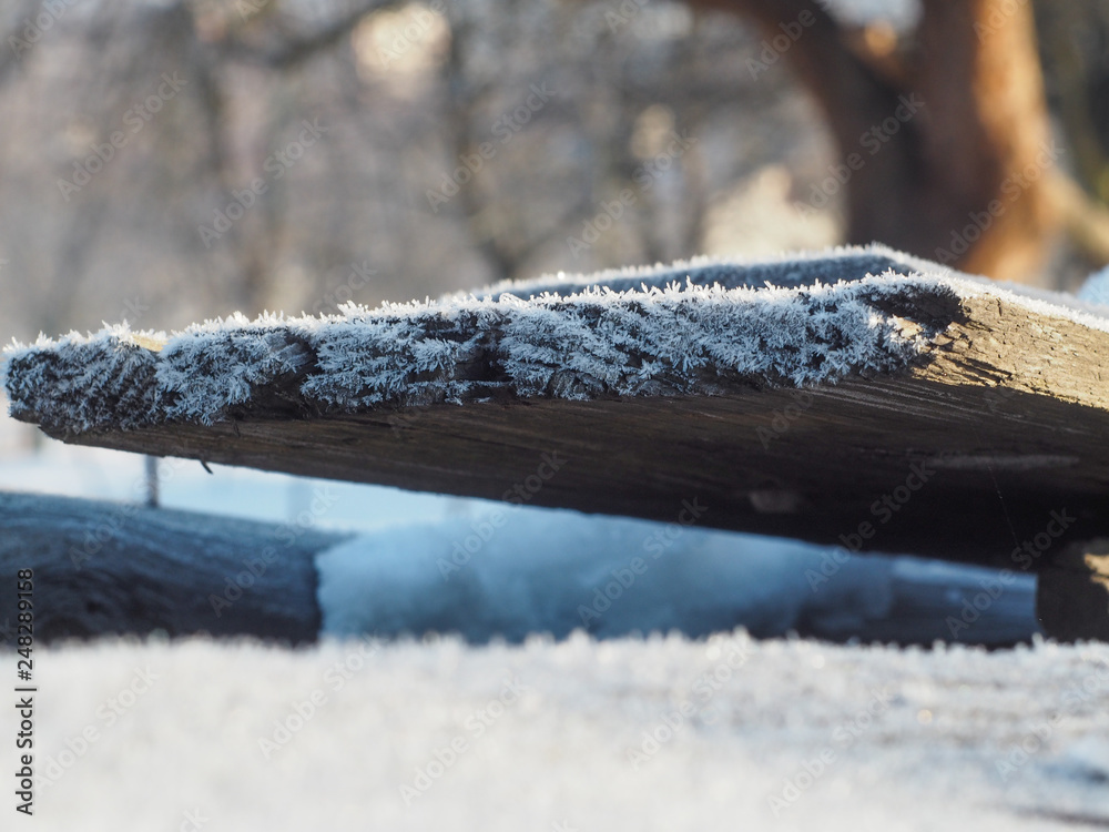 A wooden board covered with frost A wooden board covered with frost