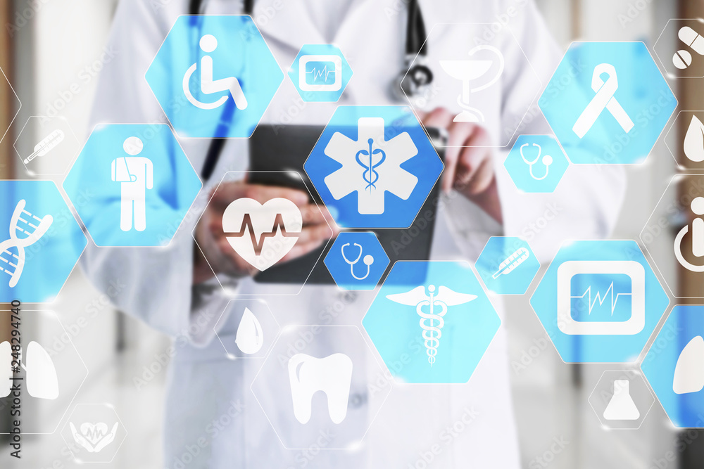 Medical network connection on the virtual touch screen and Doctor with stethoscope in hospital background.Technology and medicine concept. Medical network connection on the virtual touch screen and Doctor with stethoscope in hospital background.Technology and medicine concept.