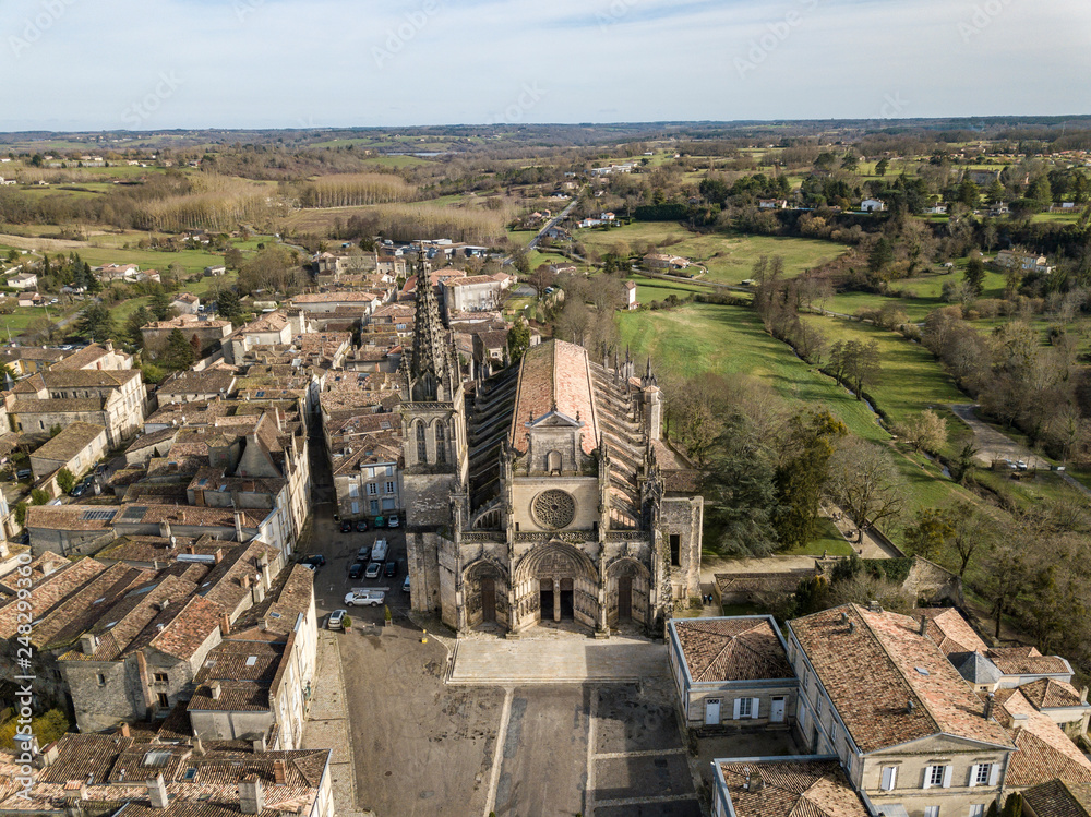 Fototapeta premium Aerial view, Cathedral of Bazas, Gironde, Aquitaine, film by drone