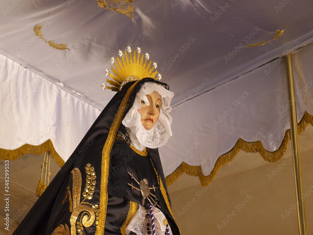 Fototapeta premium Medina de Pomar, Spain - March 30, 2018: Virgin of Sorrows waiting to be paraded in the procession of Holy week in Burgos