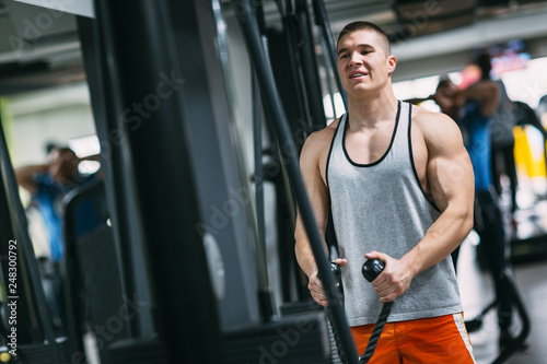 Handsome bodybuilder works out