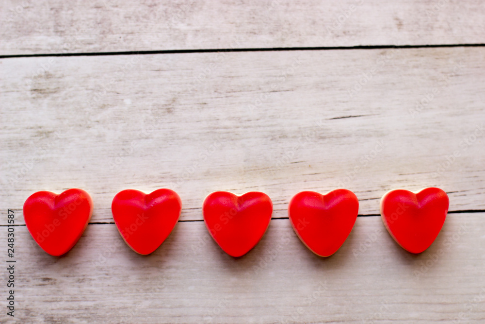 Jelly hearts on the wooden background. Valentine Day Concept. Jelly hearts on the wooden background. Valentine Day Concept.