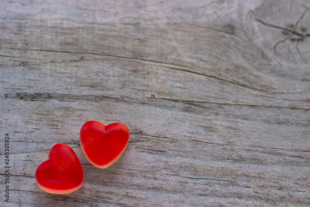 Jelly hearts on the wooden background. Valentine Day Concept. Jelly hearts on the wooden background. Valentine Day Concept.