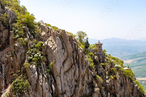 Sanhuang Basilica on a cliff on the top of Songshan Mountain, Dengfeng, Henan, China. Songshan is the tallest of the 5 sacred mountains of China dedicated to Taoism, near the famous Shaolin temple photo